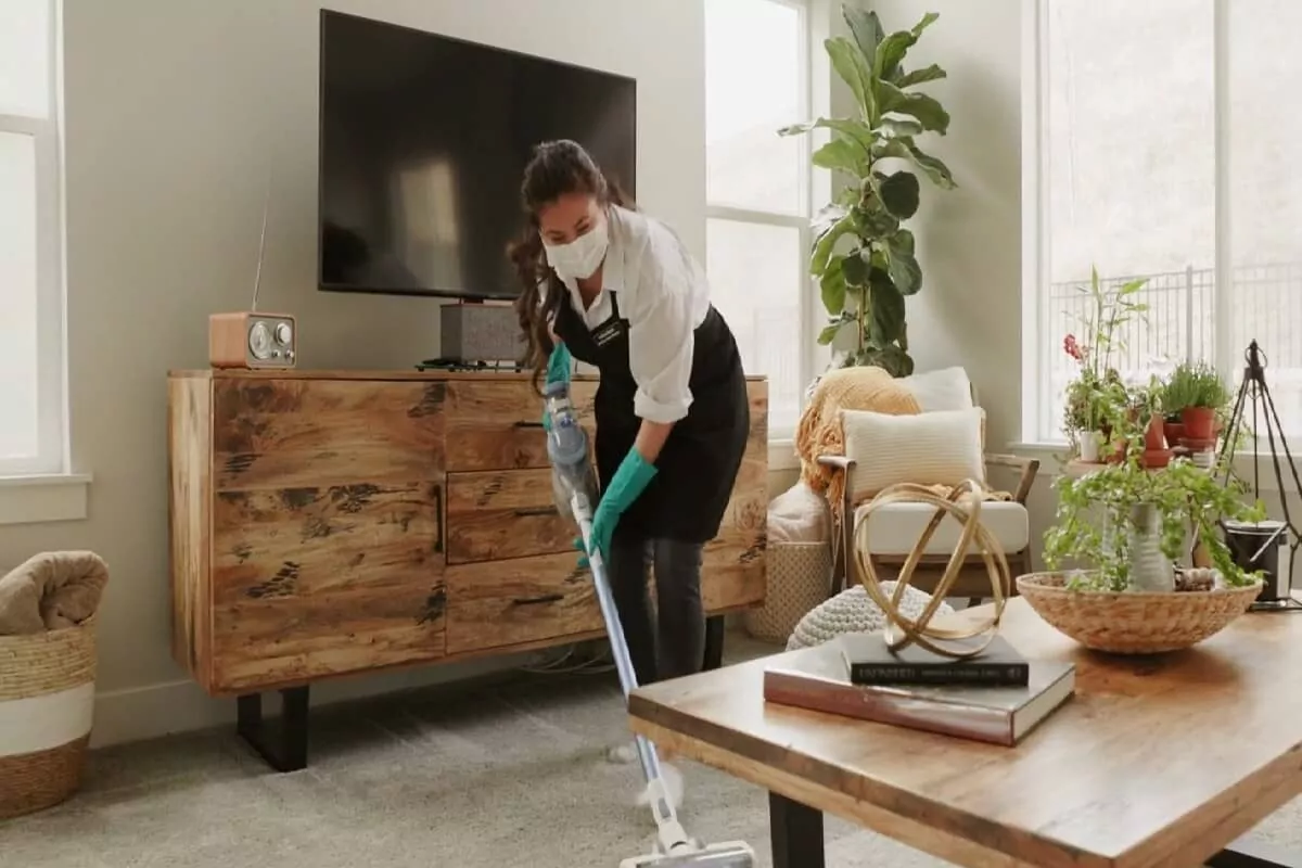professional cleaner cleaning a house